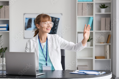 Female doctor in AR glasses...
