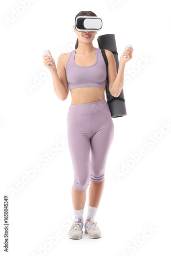 Sporty young woman in VR gl...