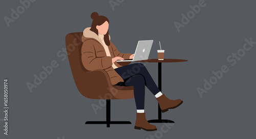 Young woman in a winter coat focused on her laptop at a cafe table with coffee. Represents remote work, digital nomad, or casual online activity.