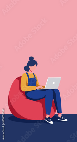A young woman works or studies remotely on her laptop while sitting comfortably on a bean bag chair. Ideal for concepts of telecommuting, online learning, and relaxed productivity.