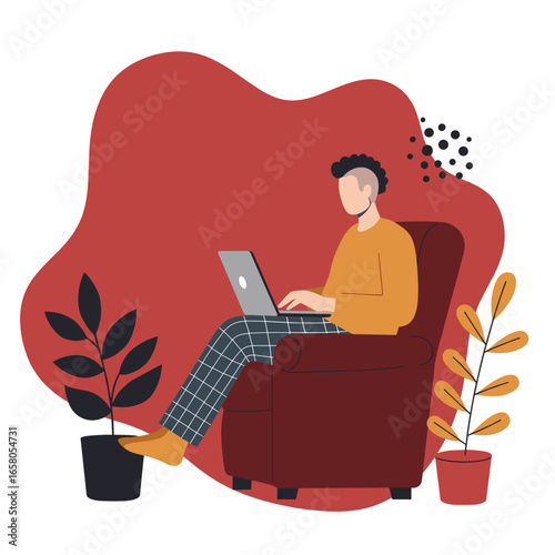 Person working on a laptop from a cozy armchair at home, ideal for remote work, online learning, and modern digital lifestyle concepts.
