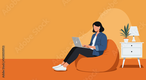 Woman productively working on laptop from a comfy bean bag chair. Ideal for illustrating remote work, flexible learning, or a relaxed modern lifestyle.