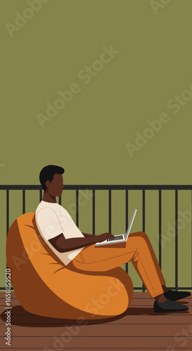 A relaxed young man works on his laptop from a comfortable bean bag chair on a balcony, depicting remote work, freelance lifestyle, or online education.