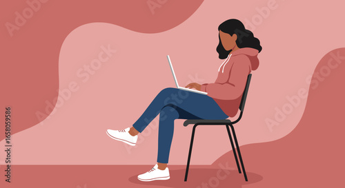 Young woman focused on her laptop, embodying remote work, online learning, or digital connection. Ideal for lifestyle, education, and technology concepts.