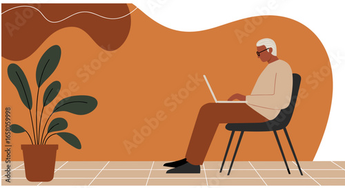 Elderly man using laptop, depicting remote work, online learning, or digital engagement for active seniors in a modern, minimalist home setting.