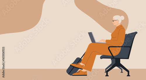 Mature woman busy working on her laptop while sitting with luggage, symbolizing remote work, travel, and flexible modern lifestyle.