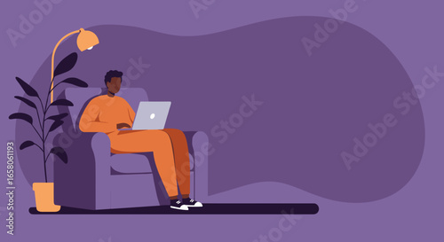 African American man comfortably works from home on his laptop, sitting in an armchair with a floor lamp and plant. Depicts remote work, online education, or leisure activity.