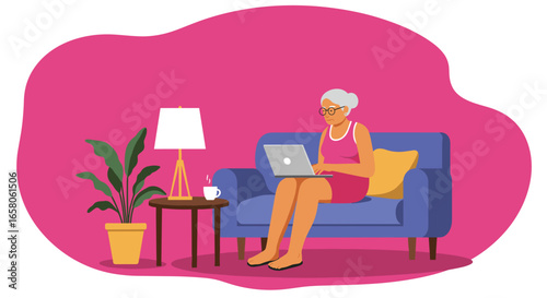 Elderly woman comfortably using a laptop on a couch at home, highlighting technology adoption by seniors and a modern lifestyle.
