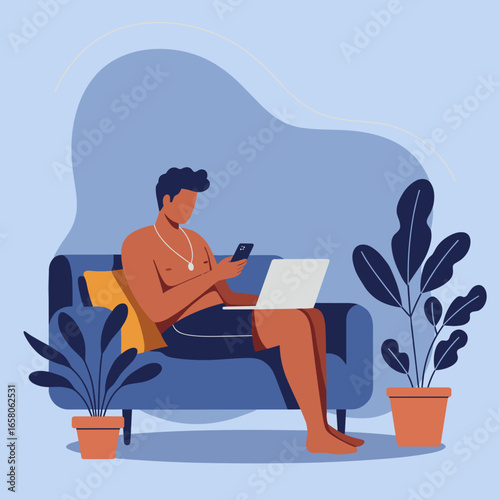 Man relaxes on a couch, using smartphone and laptop. Ideal for remote work, digital lifestyle, and home comfort concepts.