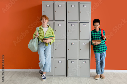Teenage students with books...