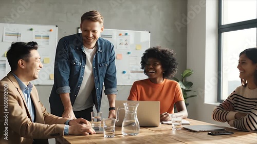 Diverse Professional Team Laughing and Collaborating in a Modern Office Meeting Happy Business People Enjoying Productive Discussion and Teamwork