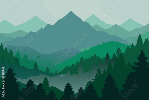 Serene mountain landscape with layered evergreen forests and misty peaks