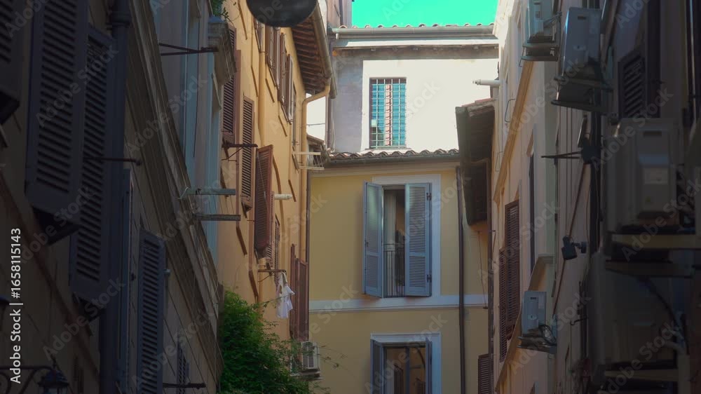 Narrow residential Roman alley with shuttered windows, air conditioning ...