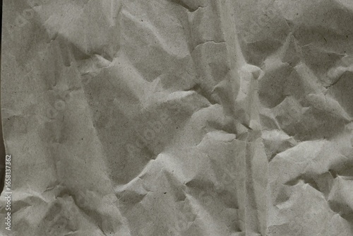 Brown crumpled recycled paper texture background. Kraft Paper