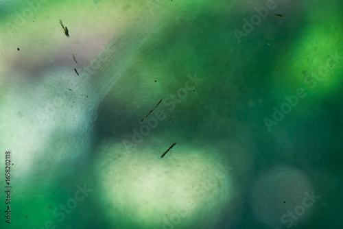 Abstract Green and Blue Background with Scratched Glass Texture