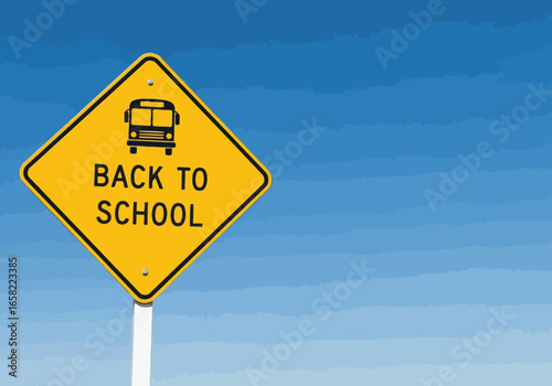 A yellow diamondshaped sign depicting a school bus and the text back to school against a blue sky