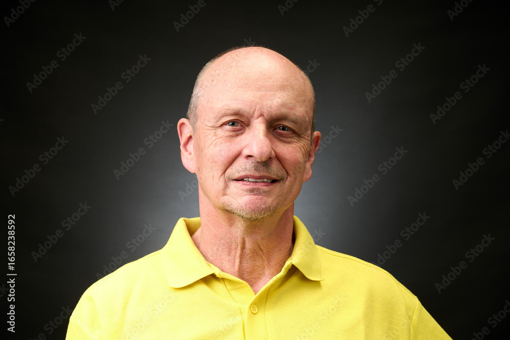 Fototapeta premium Portrait of a senior man in a vintage Harcourt style lighting