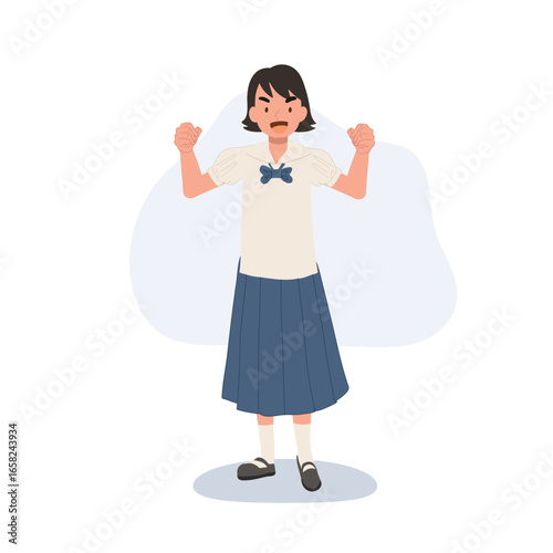 asian schoolgirl in uniform with strong pose symbolizing success confidence and positive energy