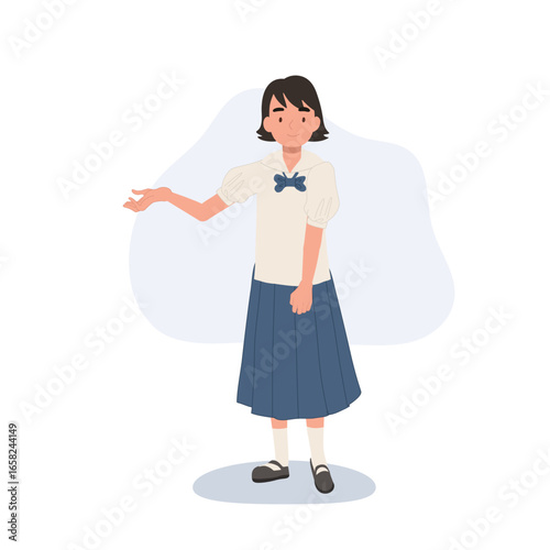 a thai schoolgirl in traditional student uniform standing with hand gesture showing a cultural education concept in asia