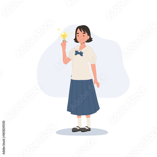 schoolgirl child in thai style uniform with bright idea light bulb symbol of learning and imagination