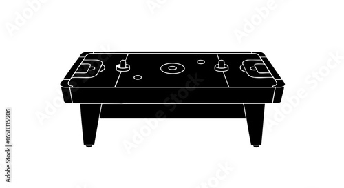 A black and white photo of a foosball table.