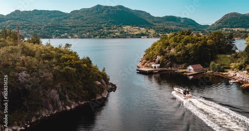 yacht entering the fjord in norway