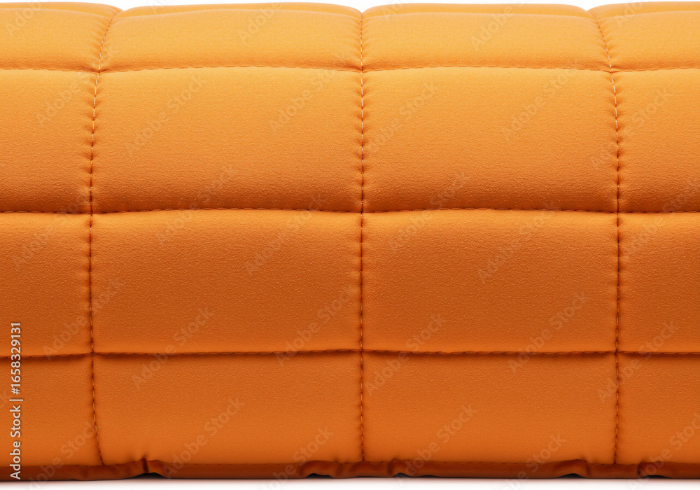 Naklejka premium Quilted Orange Cushion with Precise Stitching and Soft Texture Detail