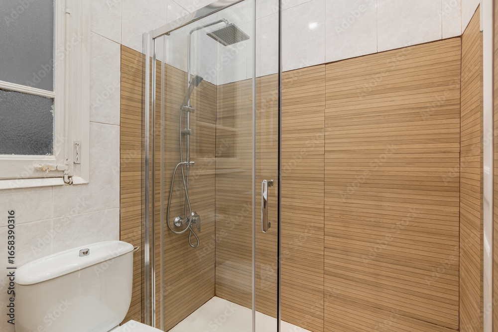 custom made wallpaper toronto digitalModern bathroom with a glass shower enclosure and wooden wall panels. White toilet and tiled floor are visible. Bright lighting enhances the clean design.