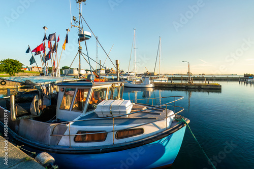 Fotografija Saltwork and steel ,fishing boats in Ronne harbor waits like a workhorse of the