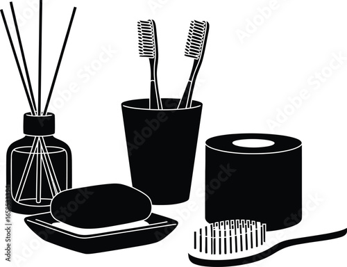 Bathroom essentials including a reed diffuser soap toothbrush holder and brush
