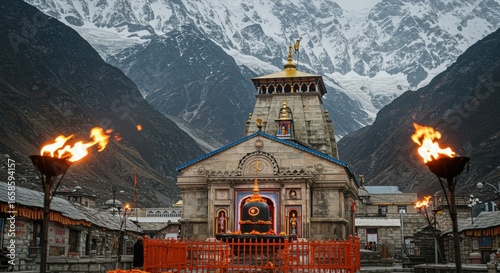 Kedarnath Temple with Flaming Torches and Snow- Capped Mountains