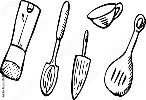 Collection of assorted kitchen utensils for cooking and baking