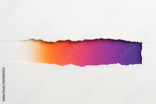 Wallpaper Mural Horizontal rip in white paper exposes a colorful orange-to-magenta-to-purple gradient. Clean, minimal abstract backdrop with copy space. Unbranded template for banners and design. Torontodigital.ca
