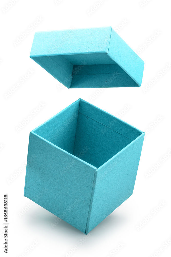 Fototapeta premium Open empty blue gift box and lid floating above a box isolated on white background. File contains clipping path.