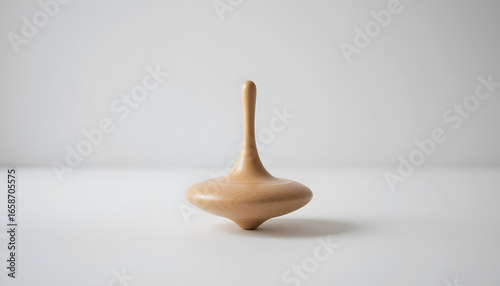 Wooden Spinning Top on White Surface