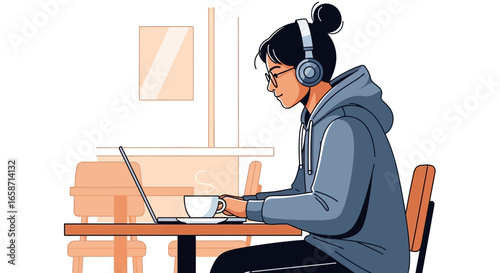 Focused Young Woman Working On Laptop At Cafe Wearing Headphones