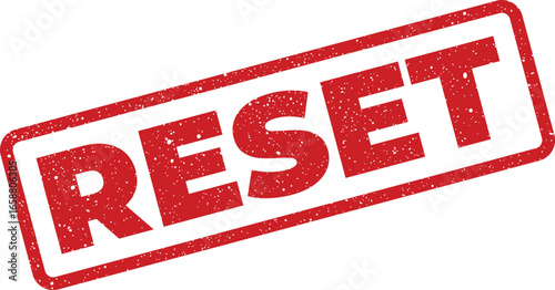 Red grunge rubber stamp with the word RESET in a textured design