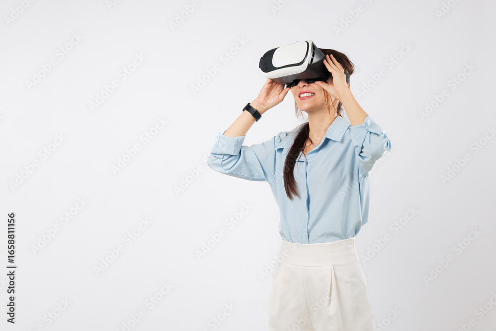 Young asian woman using vr headset for virtual reality game is excited about teenage future, experiencing online tech, she explores vr worlds and adventures with delight, isolated white background Young asian woman using vr headset for virtual reality game is excited about teenage future, experiencing online tech, she explores vr worlds and adventures with delight, isolated white background