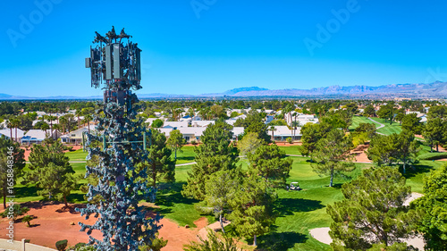 Canvas Print Aerial Camouflaged Cell Tower Over Golf Course and Residential Community