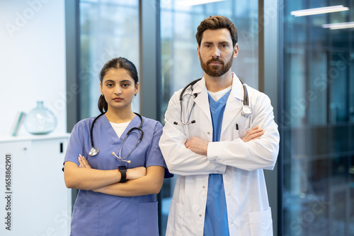 Φωτογραφία Two healthcare professionals posing confidently in a modern medical facility set