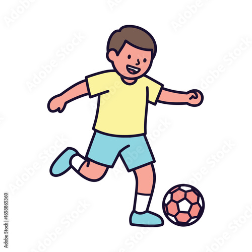 Young boy kicking soccer ball with joyful expression during game