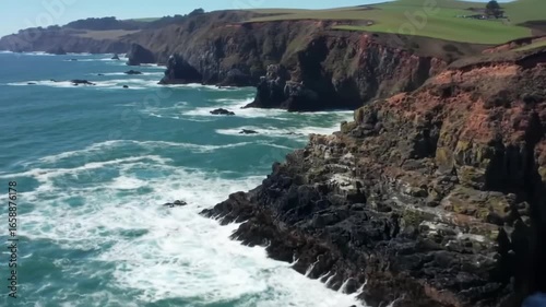 Scenic Coastal Landscape With Dramatic Cliffs And Crashing Ocean Waves