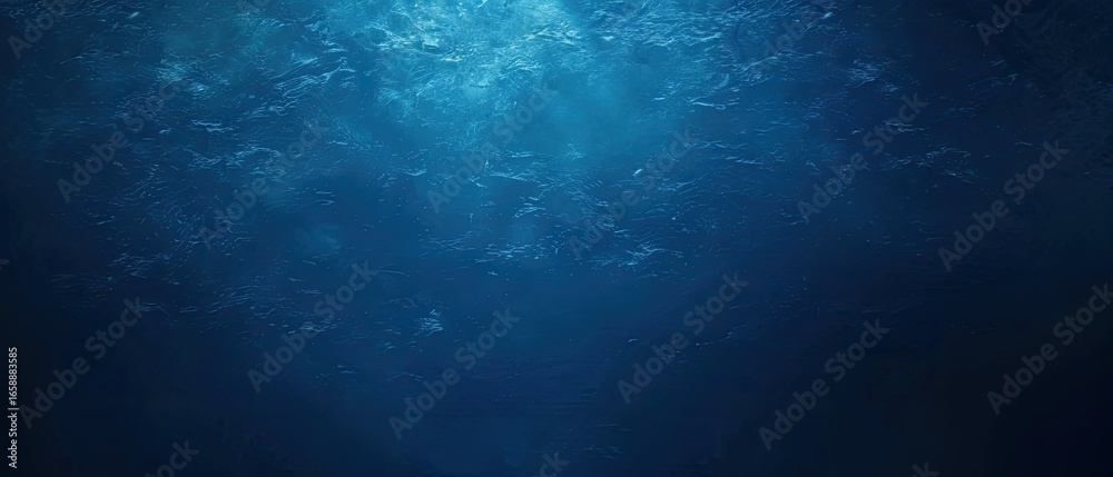 Obraz premium Underwater sunlight beams through ocean water, dark deep background, marine life backdrop