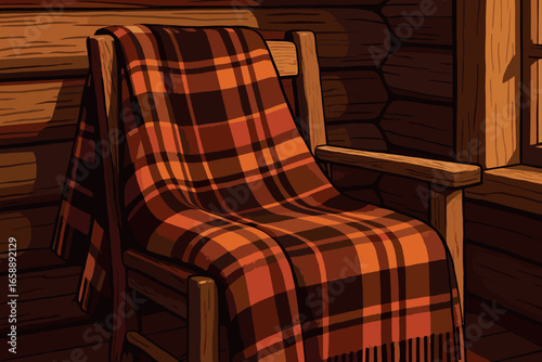 A plaid blanket draped over a rustic wooden chair, showcasing a pattern of warm oranges and browns. The setting is a cozy cabin interior, with the
