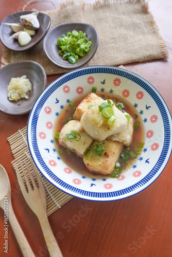 Photography Agedashi Tofu is a spicy fried tofu dish from Japan