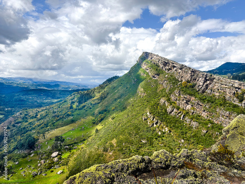 Farallones de Sutatausa mountain ridge in Cundinamarca, Colombia under blue sky and clouds