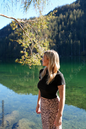 Woman on the Lake in the Mountains