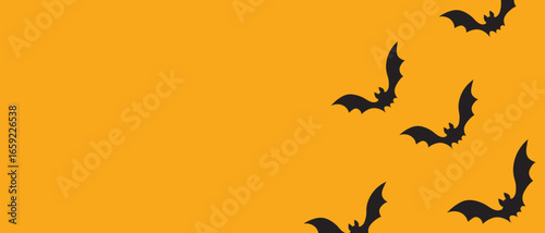 Flying Bats on an Orange Halloween Background Banner