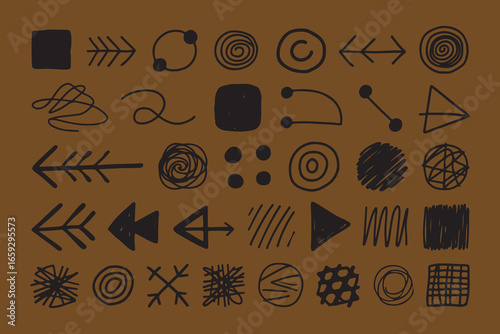 Collection of hand drawn primitive symbols and arrows on brown background