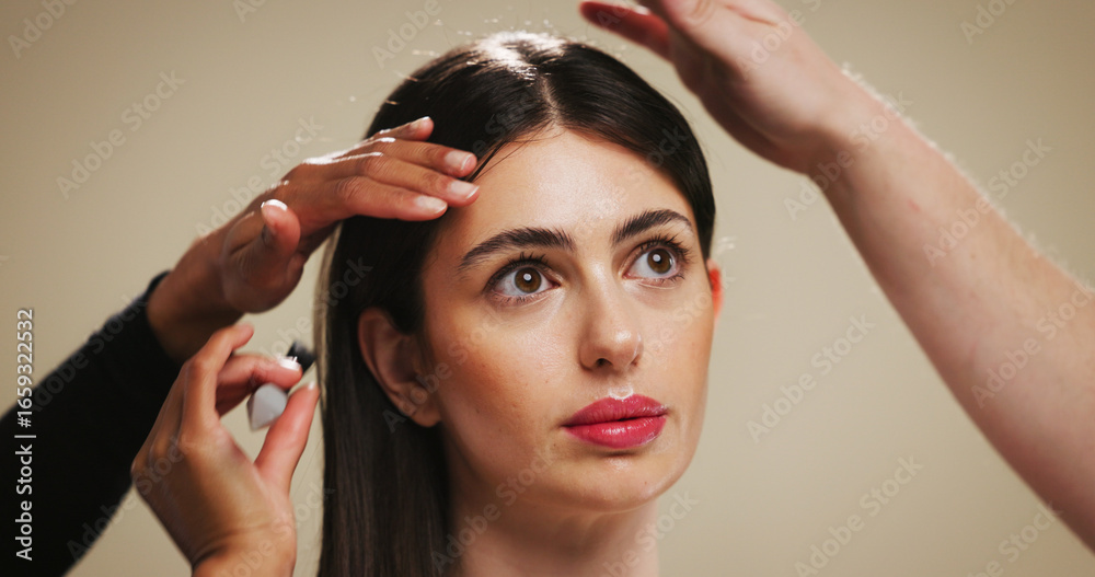 Fototapeta premium Woman, beauty and hair with treatment for styling or cosmetics on a studio background. Female person, model or thinking with makeup, style or haircare in dermatology or cosmetology for spa or salon